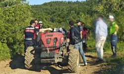 Bursa'da babasının kullandığı traktörün altında kalan çocuk ağır yaralandı