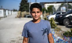 Hatay'daki orman yangınına müdahaleye, konteyner kentteki çocuklardan pet şişeli destek