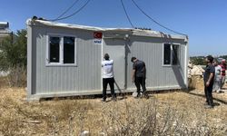 Mersin'deki orman yangınında evleri zarar görenlere konteyner desteği